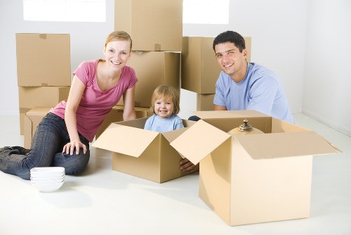 Packed storage boxes and furniture prepared for collection in Gunnersbury
