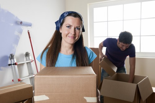 Local movers handling furniture during removals in Gunnersbury