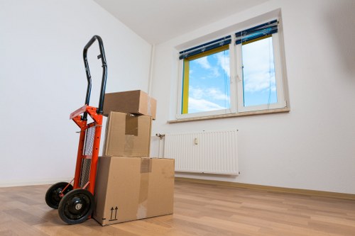 Organized storage unit in Gunnersbury with household boxes