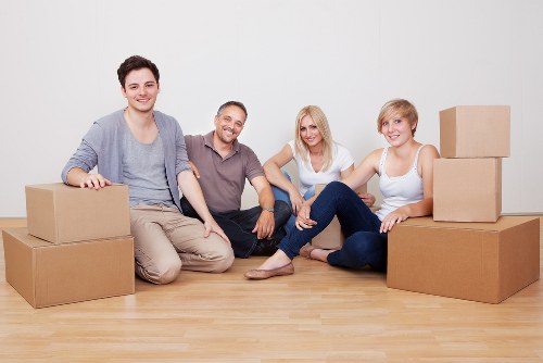 Professional movers handling compact household items in Gunnersbury